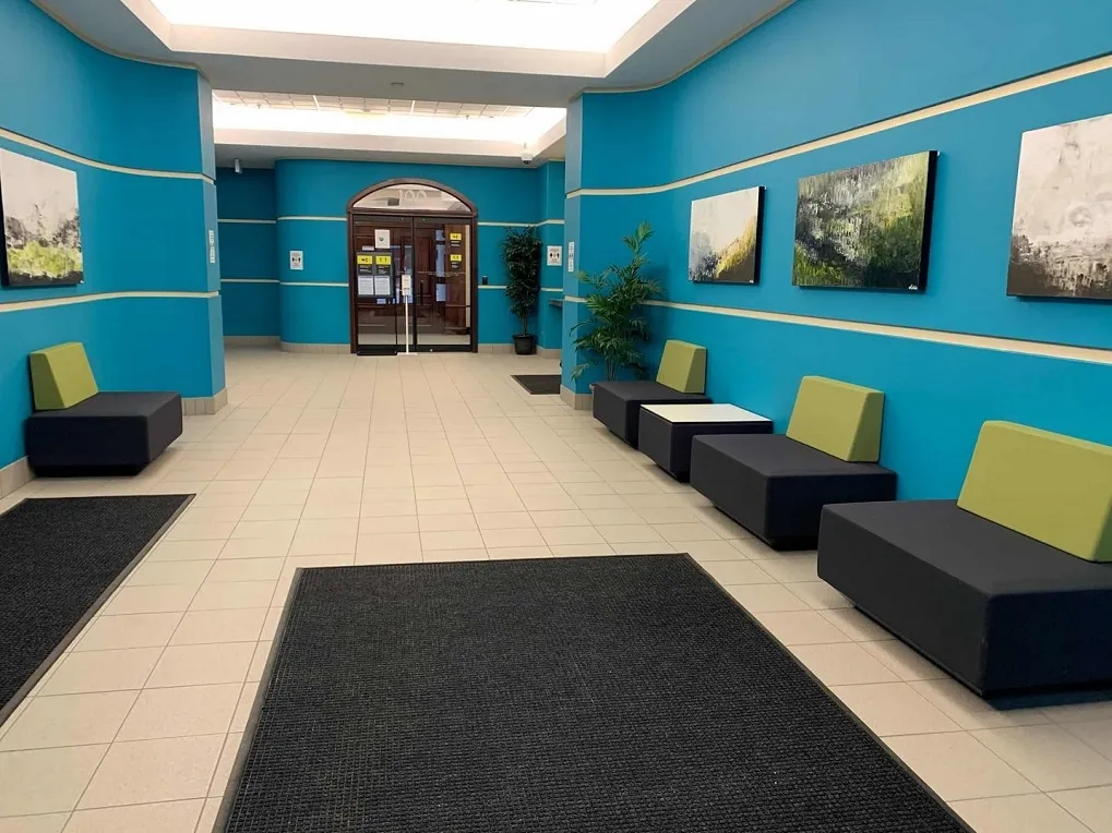 Lobby Corridor of Westmorland Place office space on lease at 82 Westmorland Street, downtown Fredericton, New Brunswick A photograph of the interiors of the energy-efficient, low-emission Westmorland Place office space on lease, showing its Beautiful, Spacious, and Smart Energy Saving-enabled Lobby Corridor at 82 Westmorland Street, downtown Fredericton, New Brunswick